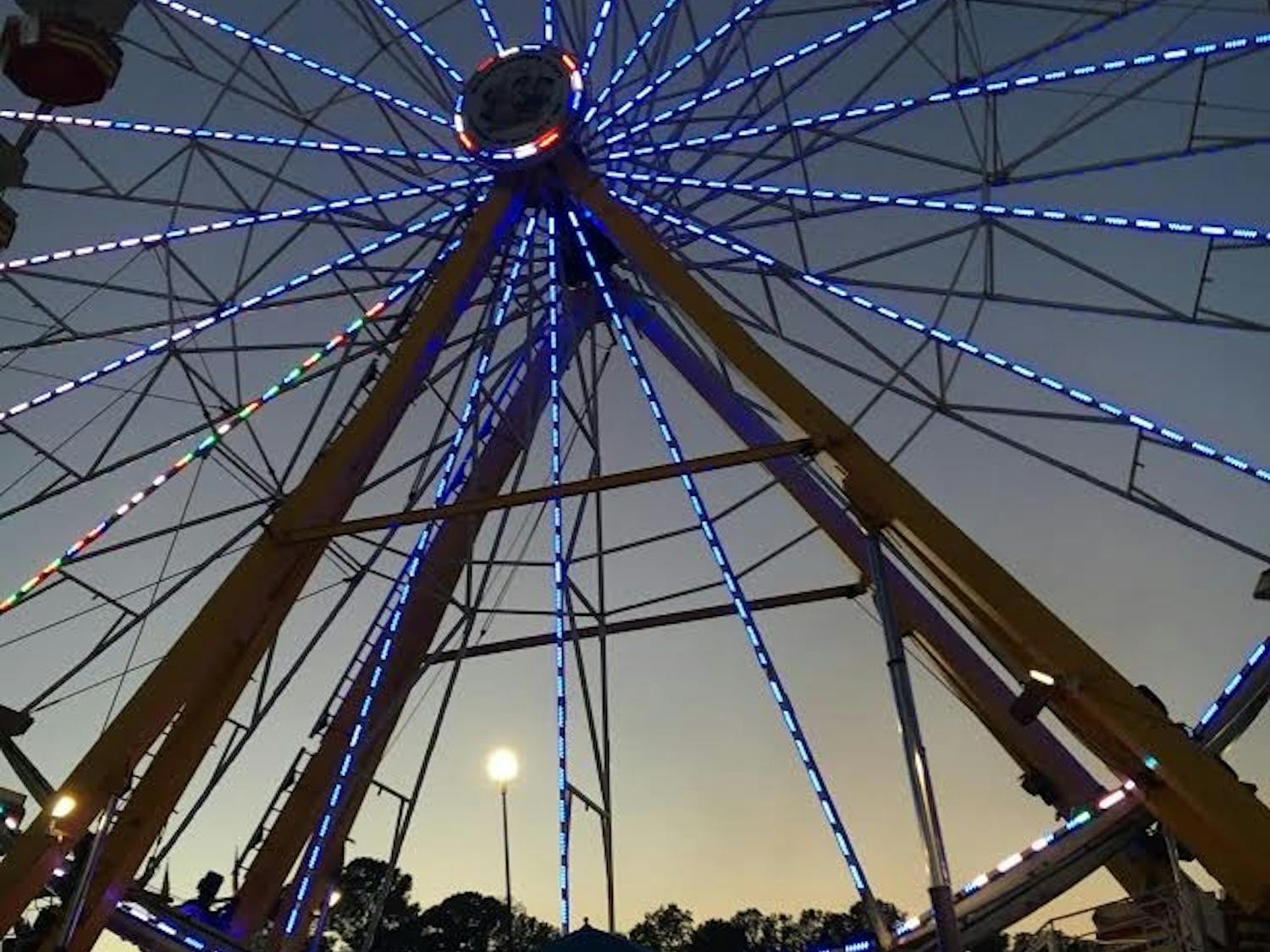 The ferris wheel is one of many attractions at the NC State Fair.
