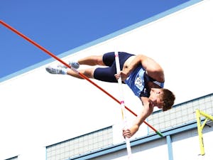 Freshman Joe Hutchinson, track and field athlete from Britain who will be running 300 meters with the Olympic torch this summer, pole vaults at a meet on Saturday. Hutchinson said it's great publicity for the sport and for his high school back home, and that's really what he cares about. The torch will be carried in Britain for 62 days with 300 people carrying it per day. 