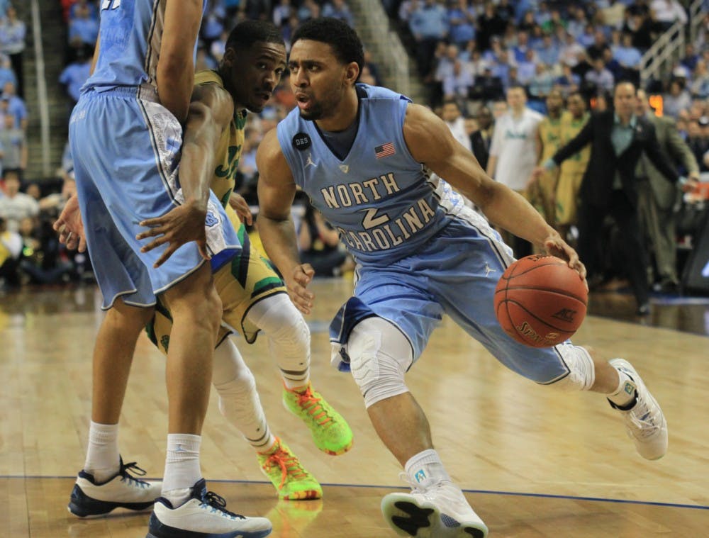 <p>North Carolina freshman Joel Berry (2) drives the ball down court. Berry played 16 minutes and scored seven points.</p>