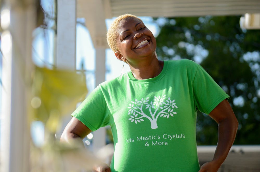 <p>Loretha Johnson, the owner of Ms. Mastic's Crystals &amp; More, stands outside Midway Market on Aug. 8, 2022. Johnson began her business at pop up shops hosted at Midway Market.</p>