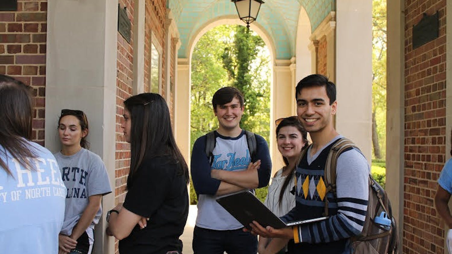 Seniors wait in line to take part in the tradition of climbing Morehead-Patterson Bell Tower on April 18.