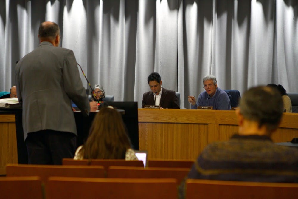 Members of the Chapel Hill Town Council answer questions about the development of the Obey Creek.