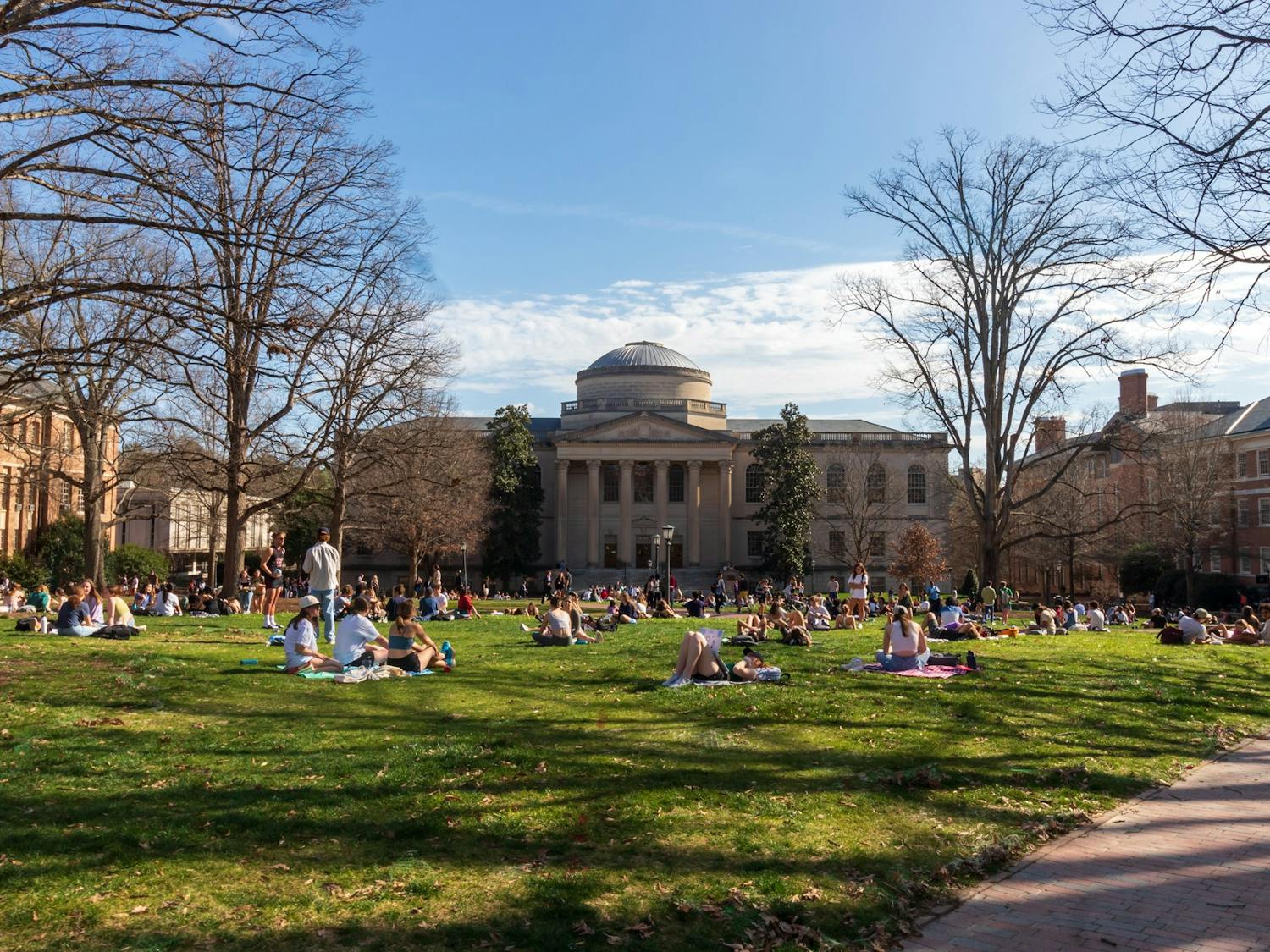 Students enjoy the rare warm winter weather on the quad on Friday, Feb. 26, 2023.
