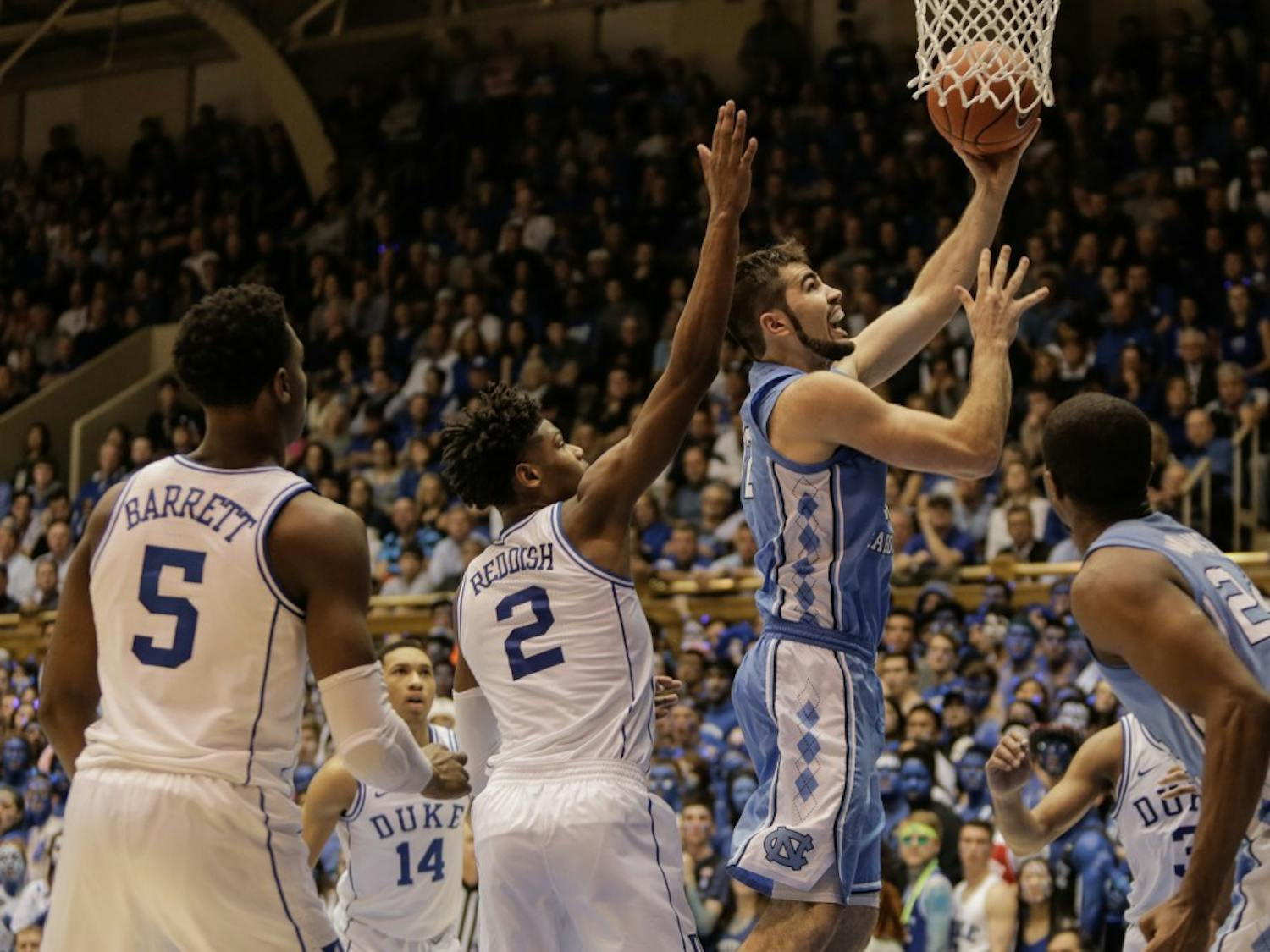 UNC forward Luke Maye (32) takes a shot during Wednesday night's game at Cameron Indoor Stadium. Maye scored 30 points and had 15 rebounds.&nbsp;