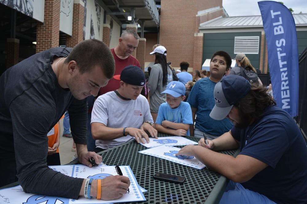 New Hope Elementary school students met with their UNC Athlete pen pals during the UNC vs Liberty baseball game Tuesday night, April 18, 2017.