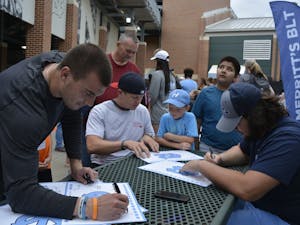 New Hope Elementary school students met with their UNC Athlete pen pals during the UNC vs Liberty baseball game Tuesday night, April 18, 2017.