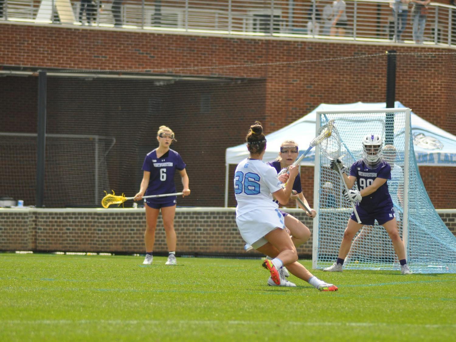 UNC graduate attacker Sam Geiersbach (36) takes a shot on goal during a women's lacrosse game against Northwestern on Sunday, March 6, 2022.  