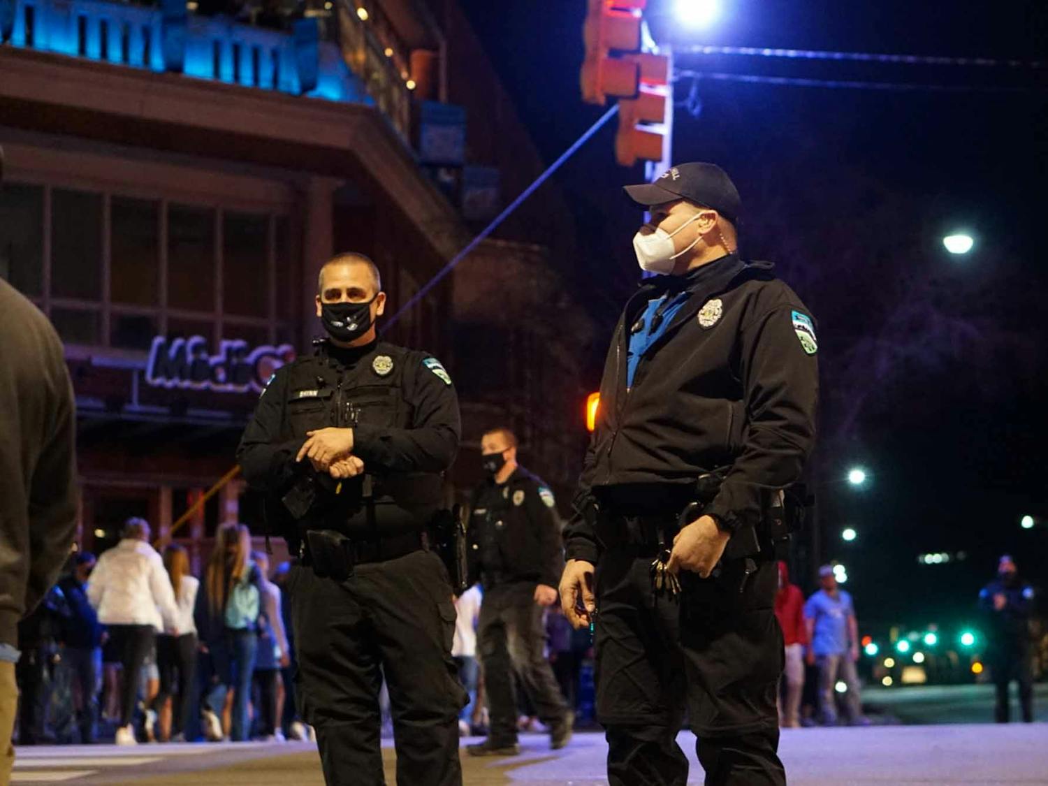 Chapel Hill police are stationed on Franklin Street during the UNC vs Duke basketball game on March 5, 2021. Police were present in an attempt to prevent students from rushing Franklin Street.