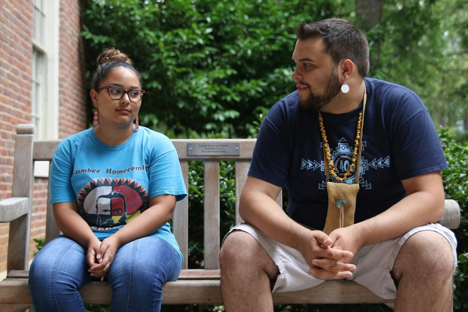 Sophomore&nbsp;Elena Polanco and First-Year Ryan Stanley sit and discuss the Lumbee tribe and their Lumbee&nbsp;heritage.