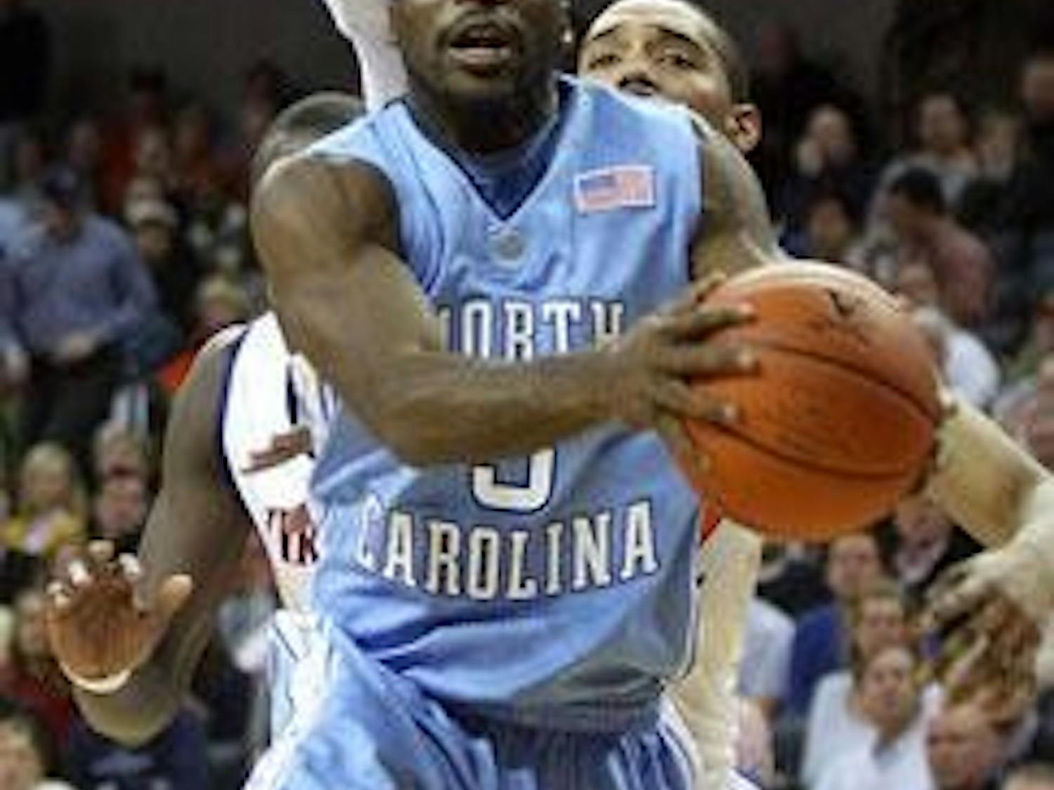 Ty Lawson shot an efficient 7-for-10 from the field for 19 points and added nine assists against Virginia in Charlottesville in a 2009 regular season game. (DTH File/Andrew Dye)