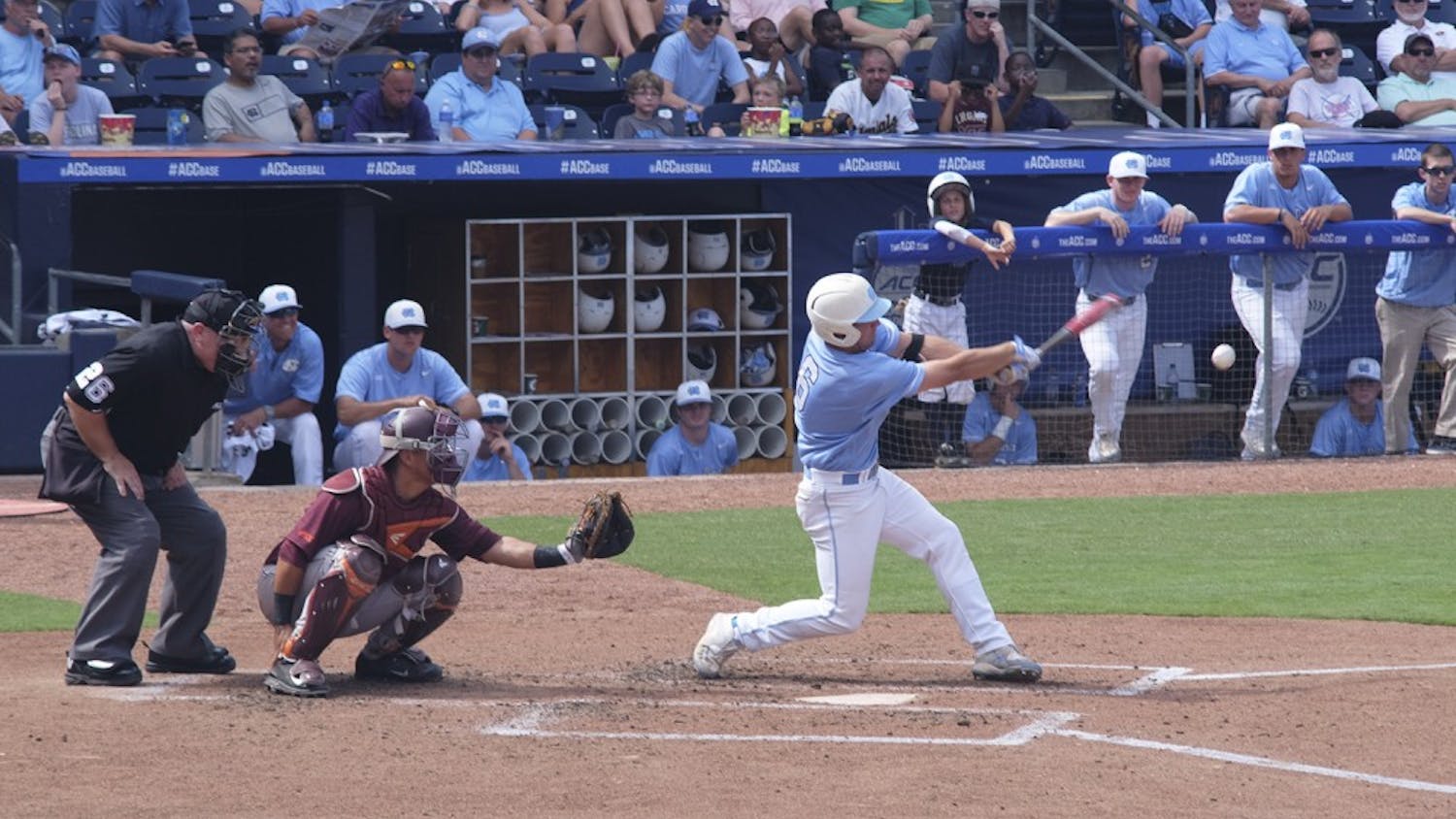 Alex Raburn makes contact with a pitch against Virginia Tech. 