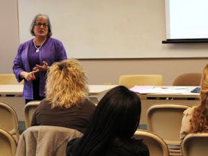 Sharon Jones, an employee for University Career Services, talks to students about teaching options for non-education majors on Monday.