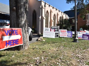 Students and local residents participate in early voting at Chapel of the Cross today. 