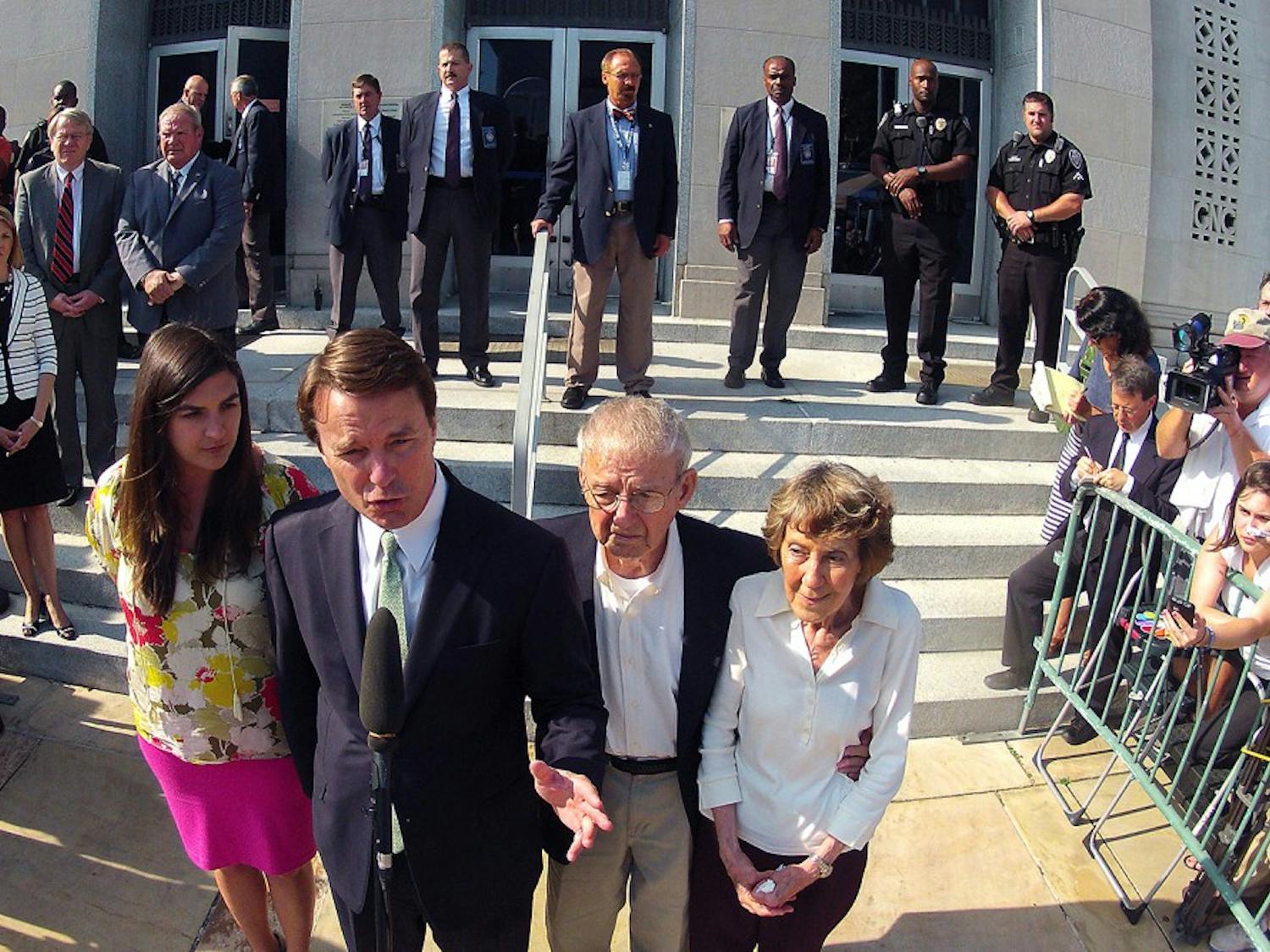 Former Sen. John Edwards speaks to the media in front of the federal courthouse in Greensboro, North Carolina, Thursday, May 31, 2012, with his family at the end of his trial. Edwards was found not guilty on one of six counts in his campaign finance trial and announced it could not agree on the five remaining counts. (Chucky Liddy/Raleigh News &amp; Observer/MCT)