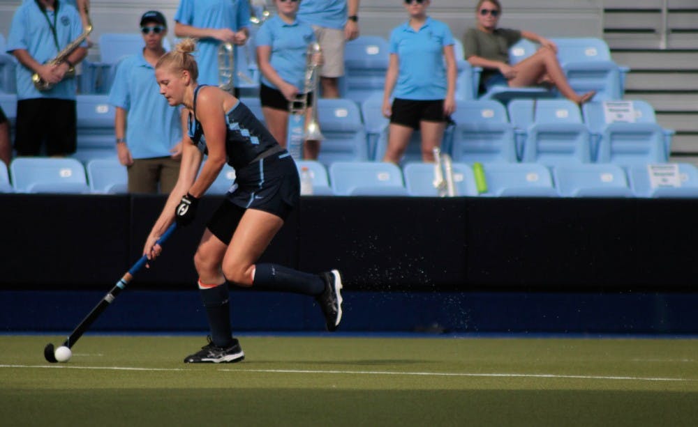 Forward Catherine Hayden (8) prepares to pass the ball on Sept. 15, 2019. UNC's field hockey team won 8-0 against William and Mary.
