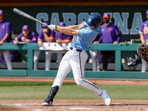 UNC junior Clemente Inclan (18) swings the bat in a game against Clemson University at Boshamer Stadium on Sunday, March 14, 2021. The Tar Heels beat the Tigers 5-3. Photo courtesy of Abe Loven.&nbsp;