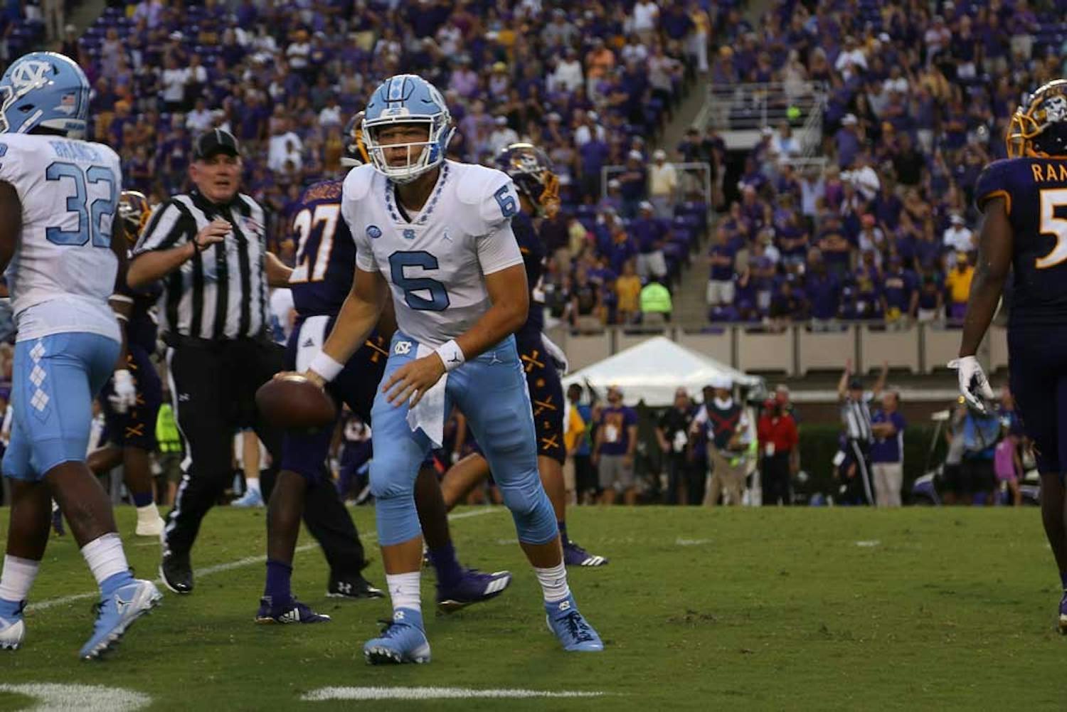 UNC first-year quarterback Cade Fortin holds the ball in his hand in a 41-19 loss to ECU in Greenville on Sept. 8.