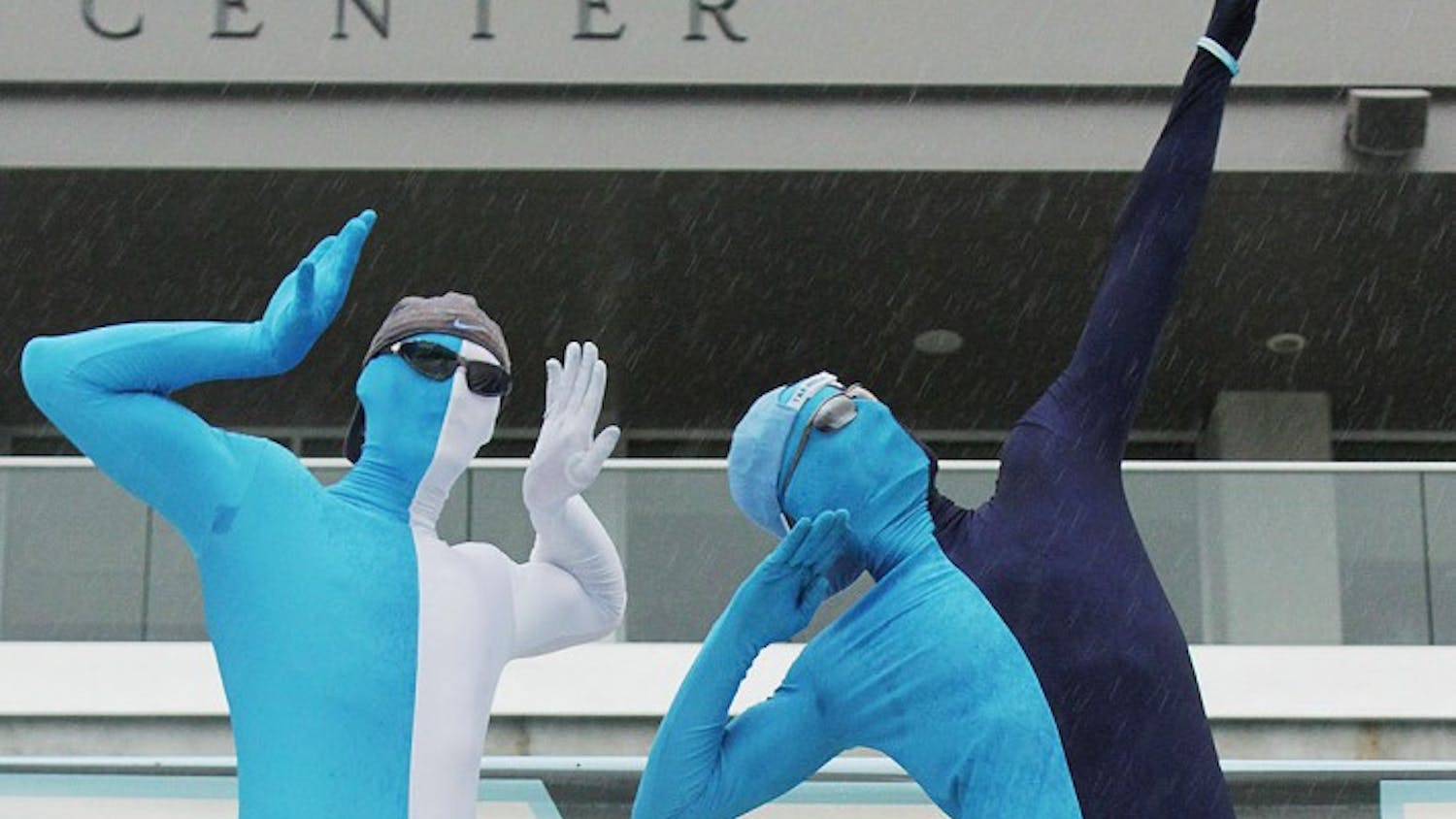 Photo: UNC's 'Blue Men' among the football team's loudest, most energetic fans (Robbie Harms)