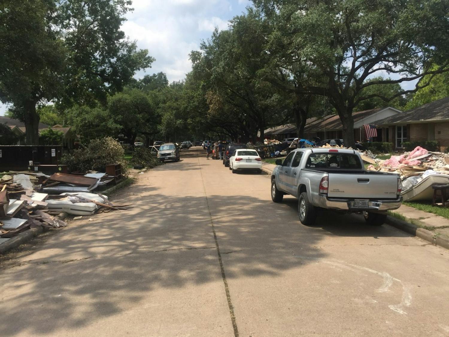 A residential street in Houston, Texas during the cleanup process after Hurricane Harvey in 2017. (Photo courtesy of  Valerie Mueller)