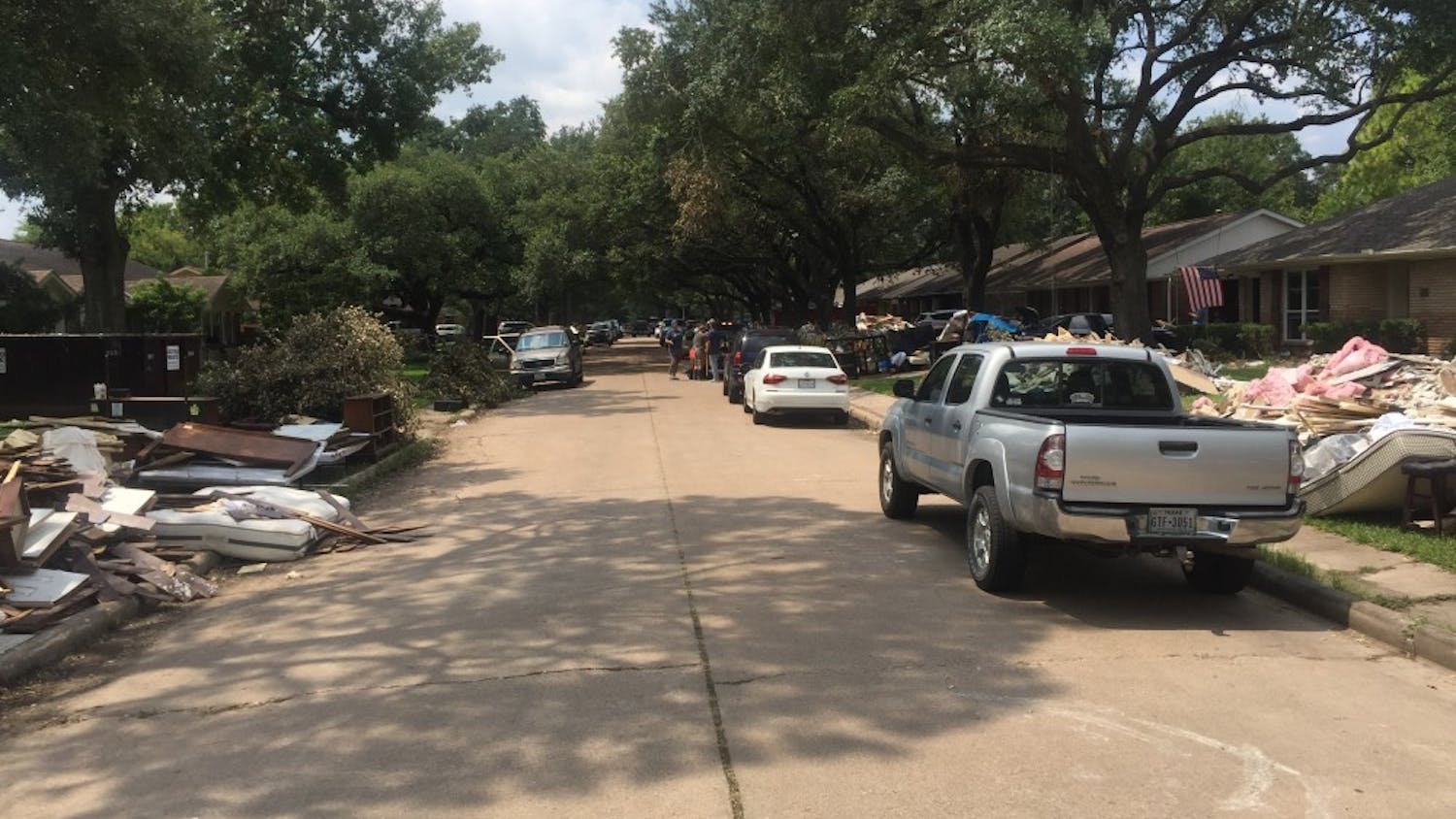 A residential street in Houston, Texas during the cleanup process after Hurricane Harvey in 2017. (Photo courtesy of  Valerie Mueller)