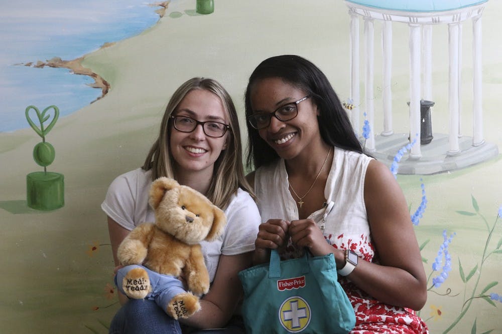 <p>Medical students Charlotte Story (left) and Ashley Thrower started a fundraiser to buy more Medical Play Kits for children recently diagnosed with cancer.</p>