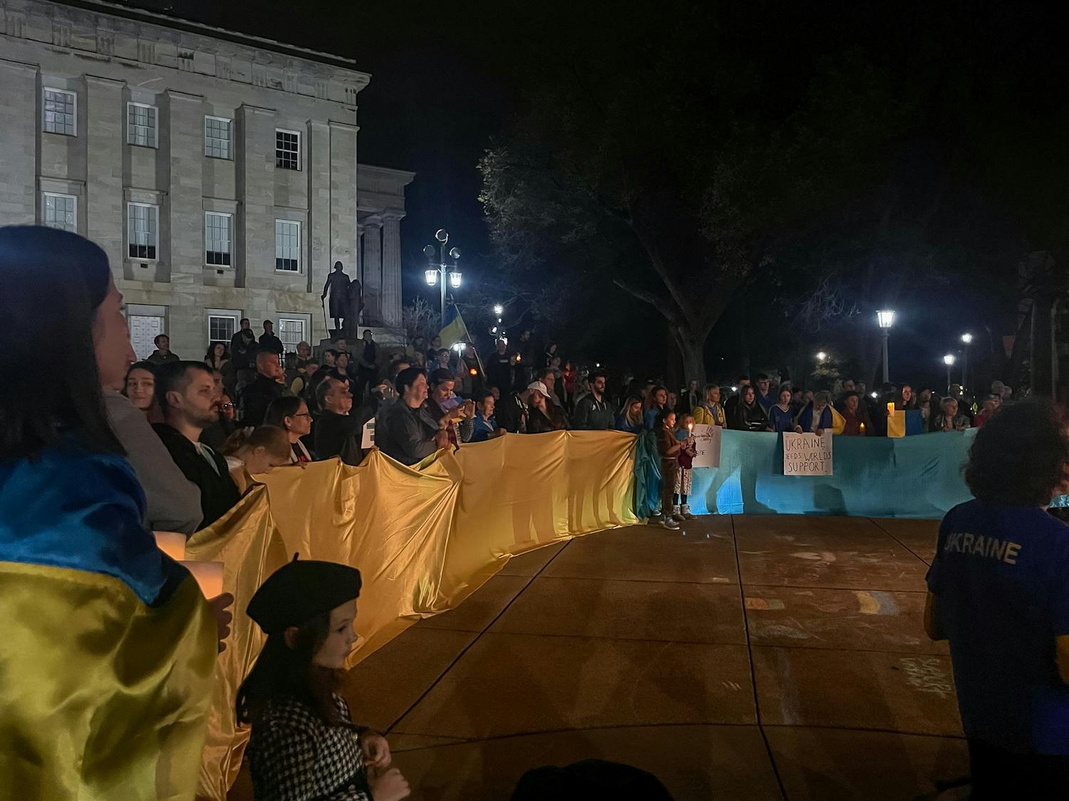 People gather to stand in solidarity with Ukraine at the Candlelight Vigil for Ukraine at the North Carolina State Capitol on Friday, Feb. 24, 2023.
Photo Courtesy of Eliza Benbow.