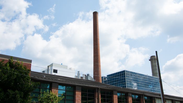 Located on Cameron Avenue, UNC’s coal-burning power plant is at risk of facing lawsuits due to its emissions. The plant sits in between several residential neighborhoods, photographed on Friday, Sept. 16, 2022.