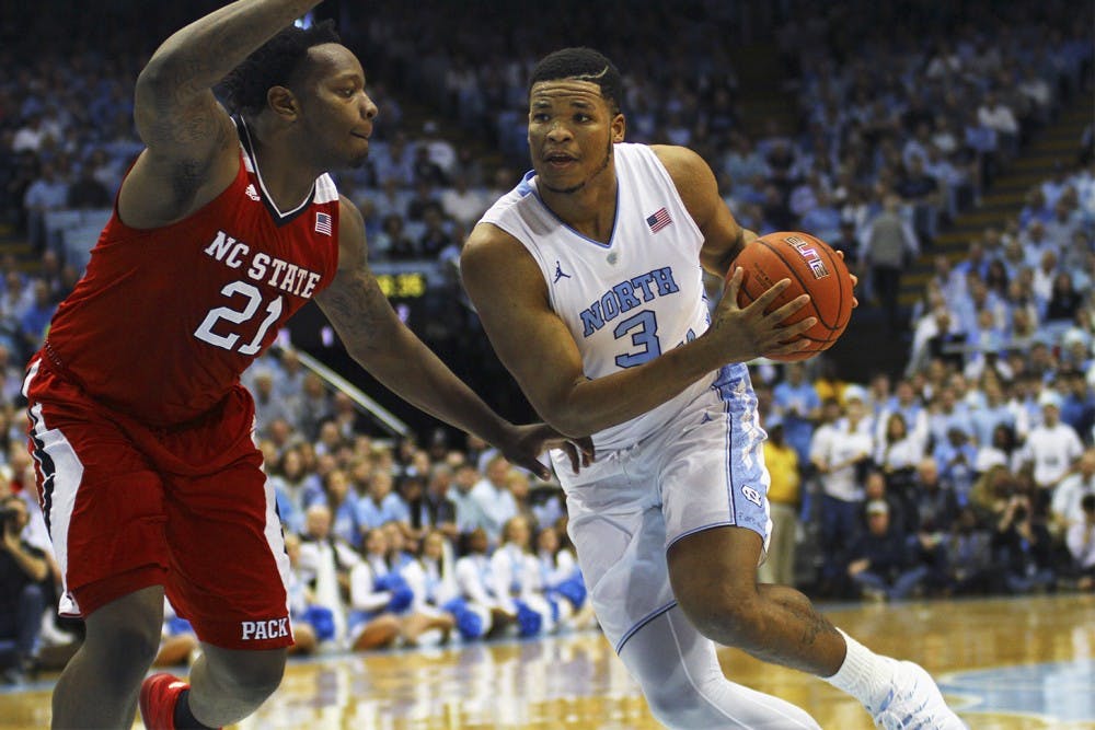 Junior Kennedy Meeks (3) helped the Tar Heels defeat NC State University 67 to 55 on Saturday afternoon.