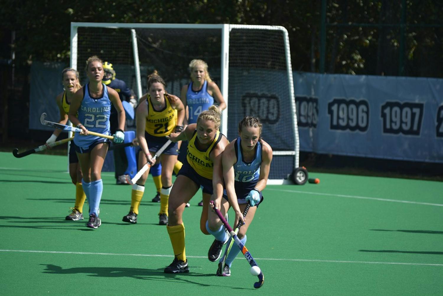 Eef Andriessen, First-year UNC Forward, fights for possession of the ball during the Tar Heels' Sunday victory over Michigan. The final score was 5-1.