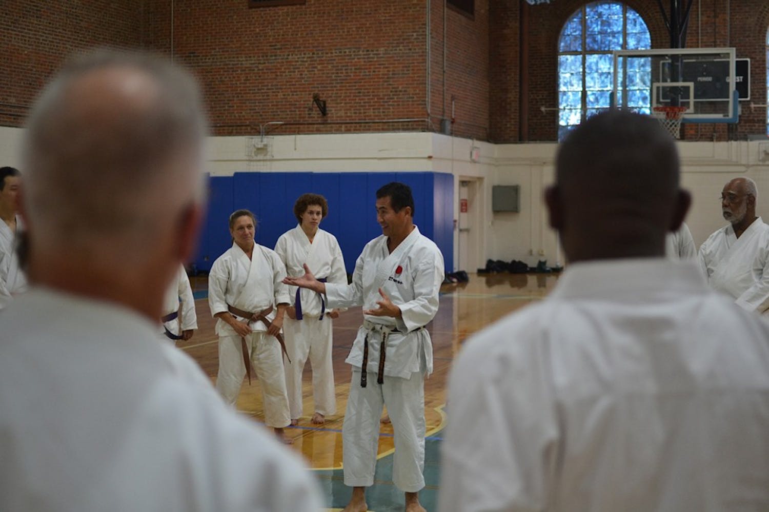 Sensai Nagatomo engages a diverse range of competitors at a UNC Shotokan Karate tournament Saturday afternoon.

