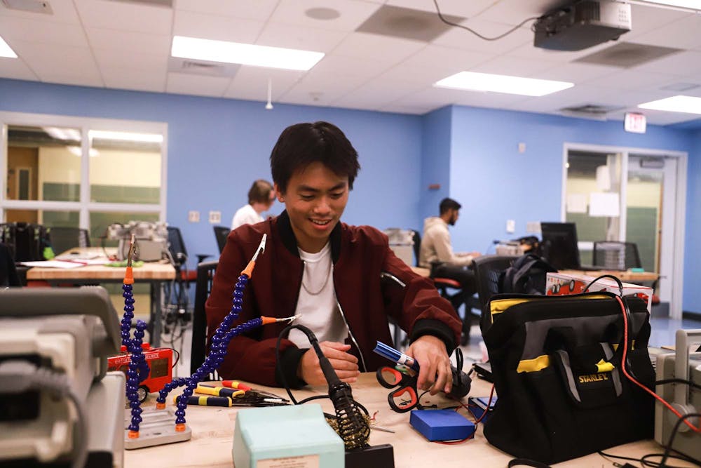 UNC senior Christopher Nguyen, a Bio-Medical Engineering major, is pictured in Phillips Hall working on modifying toys through Carolina Adapts Toys for Children on Tuesday, October 4th, 2022.