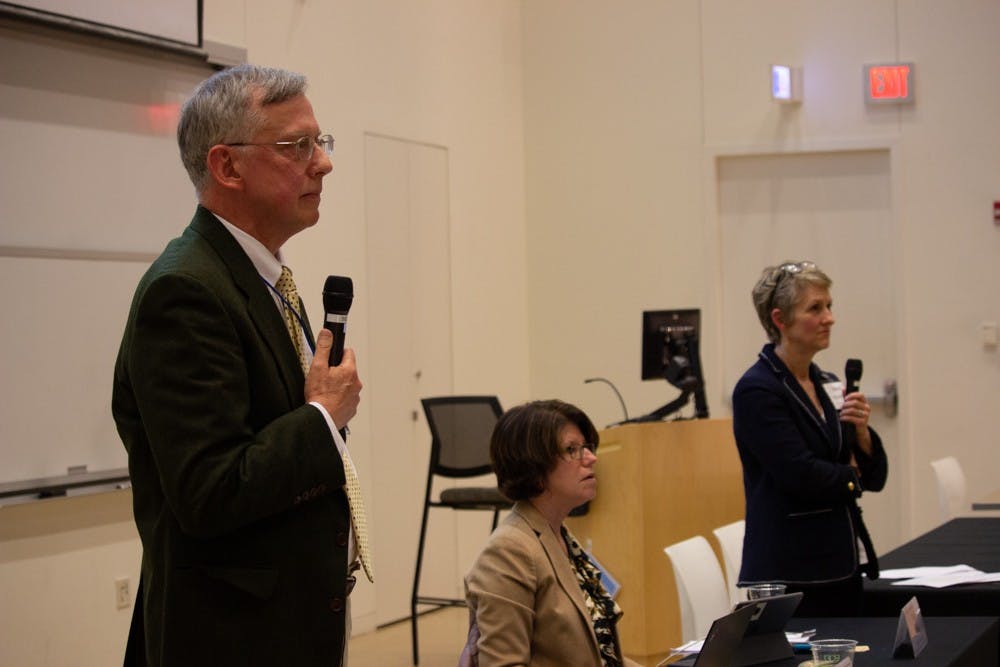 Secretary of the Faculty Vin Steponaitis, Faculty Chair Leslie Parise and Chair of the Committee Anne Klinefelter attend the meeting of the Faculty Council and the General Faculty in Genome Sciences Building on Friday, March 8, 2019.  Steponaitis and Klinefelter discussed resolutions at the meeting which sought to change the composition of fixed term faculty,  the composition and charge of the Administrative Board of the Library and the procedure for passing resolutions of the General Faculty.