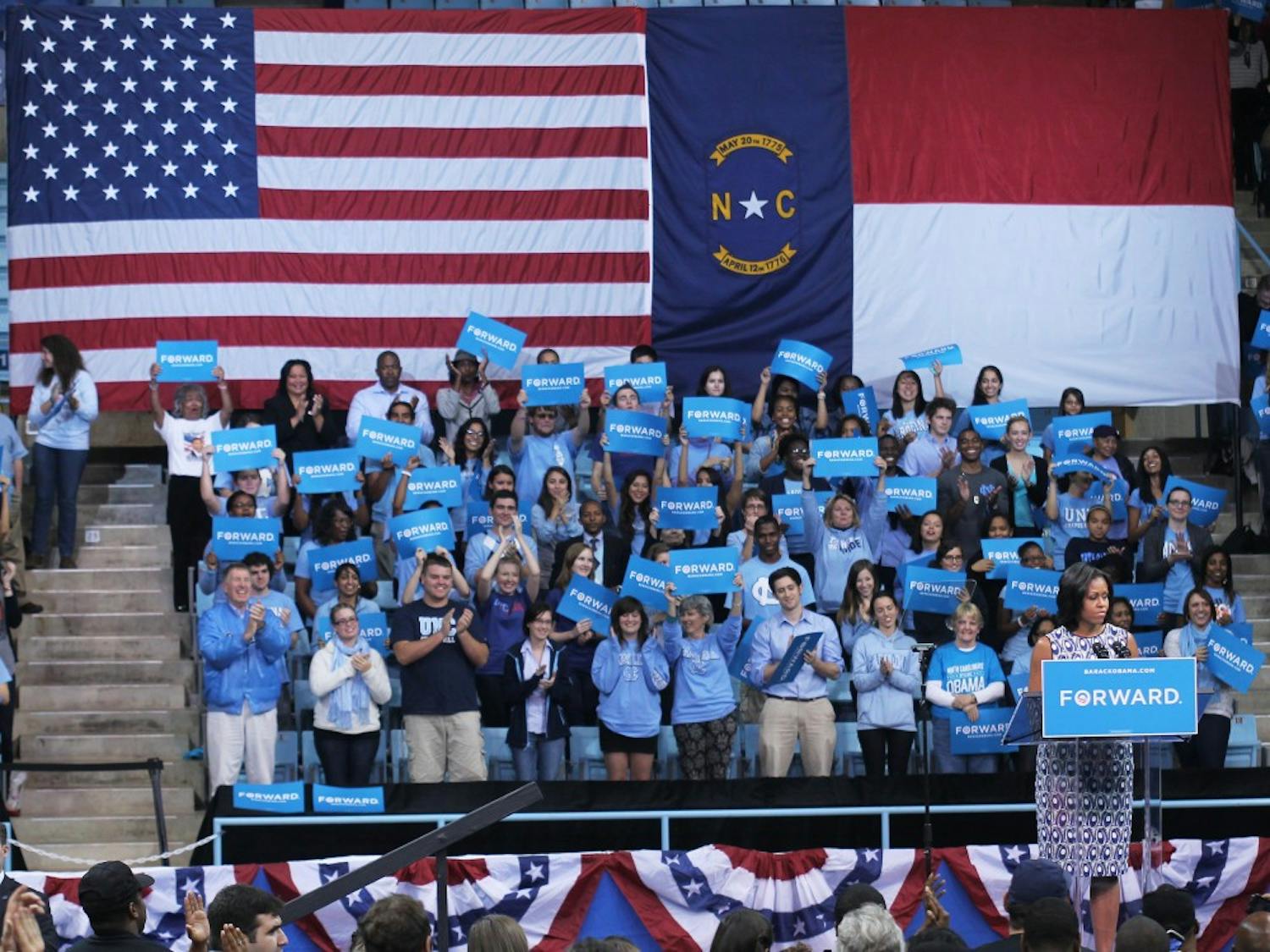 	First Lady Michelle Obama speaks to students and supporters in Carmichael Arena at UNC on Tuesday.