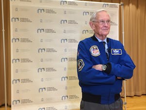 Astronaut Charlie Duke poses before a lecture at Morehead Planetarium celebrating the 50th anniversary of Apollo 11. Photo by Maydha Devarajan.