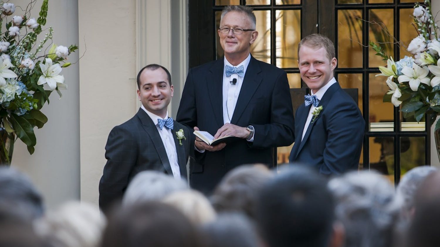 FROM LEFT: Zach Howell, officiant Dr. Jesse L. White Jr, and Garrett Hall (ALL CQ) during the first same-sex wedding ceremony ever at The Carolina Inn in Chapel Hill, NC.  on April 6, 2013.