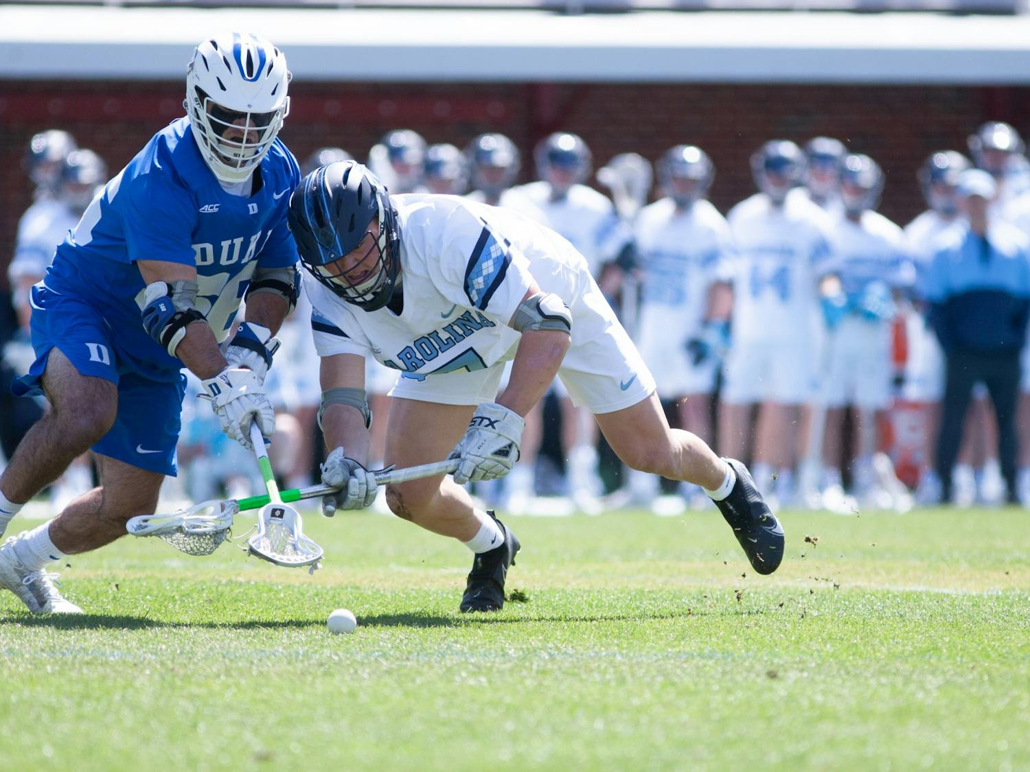 UNC senior midfielder Zac Tucci (7) fights for the ball during a home game against Duke at Dorrance Field on Saturday Apr. 2, 2022.