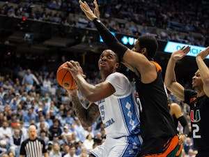 UNC senior Armando Bacot (5) looks to score a basket during the men's basketball game against Miami on Feb. 13, 2023, at the Dean Smith Center. Miami beat UNC 80-72.
