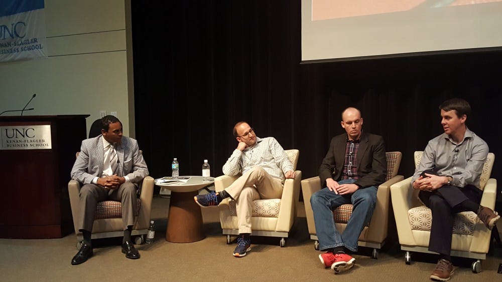 Dwayne Ballen (left) moderates a panel with&nbsp;Gabe Farkas, Patrick Lucey and Ken Pomeroy at the SPEIA Basketball Analytics Summit hosted at Kenan-Flagler Business School on Saturday.