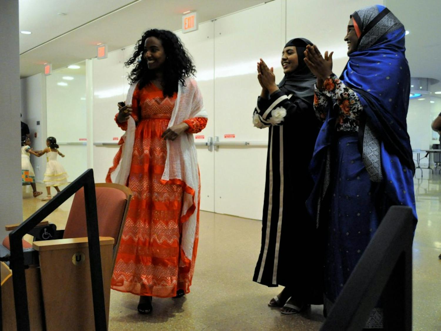 Lina Abdulrhman, a UNC-Charlotte undergraduate alumni, models a modern-day Tigrinya dress at an Eritrean Fashion Show sponsored by Campus Y and the GPSF on Wednesday, April 24, 2019 at the Genome Sciences Building.