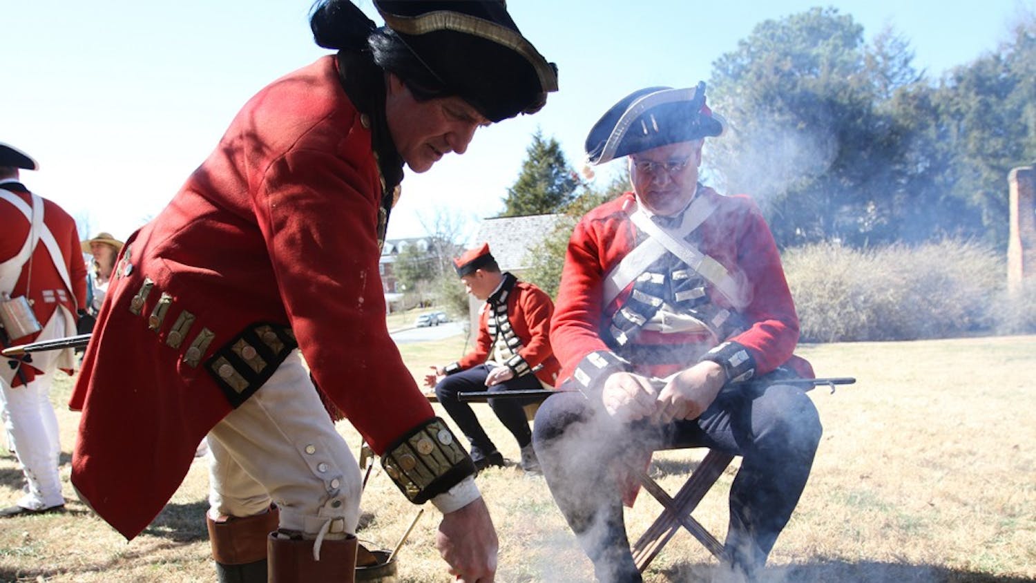 Revolutionary War reenactment as part of Twelfth Annual Revolutionary War Living History Day in Hillsborough Saturday 2-22-14. 

Reenactment of His Majesty's 64th regiment of foot during the year of 1781. 

Right-  Mark Dappert is from Charlotte, reenacting a Sgt., been reenacting for 25 years. Here he is cooking "spotted dog," salt pork and cabbage.

Left- David Snyder is from Efland, reenacting a Captain of Infantry, been reenacting since 1976 and started because of the bicentennial. He has an interest in American history and wanted to learn more about the British side of the story. 