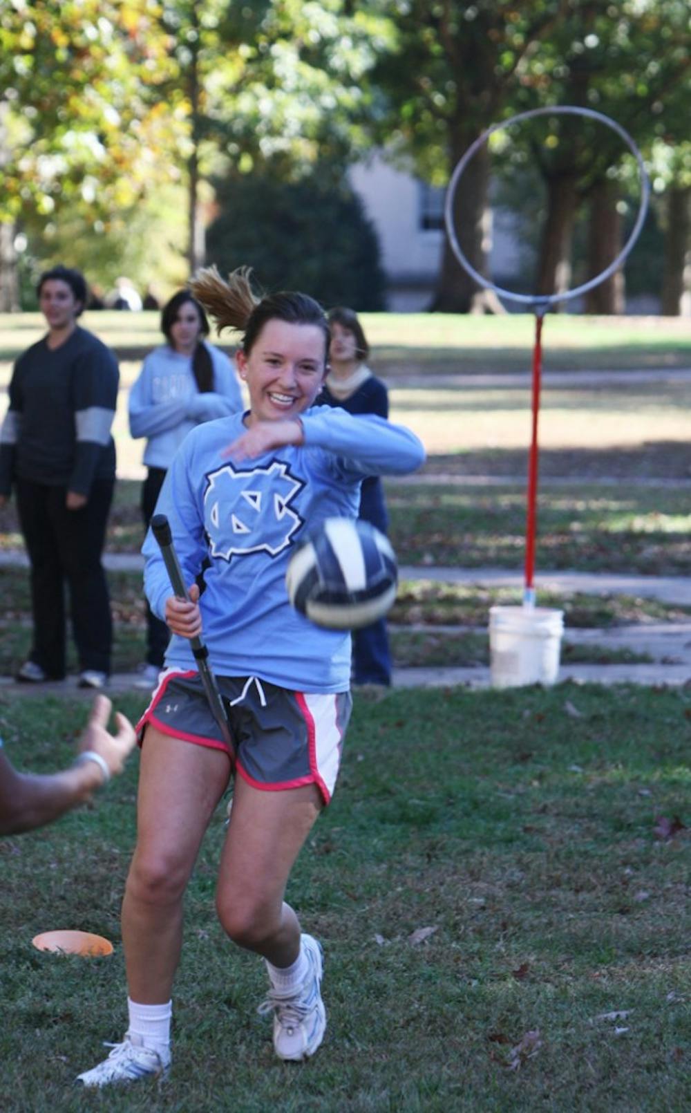 Archaeology and economics double major Sam Kiefer plays Quidditch with the UNC Quidditch team on Polk Place earlier this month.  