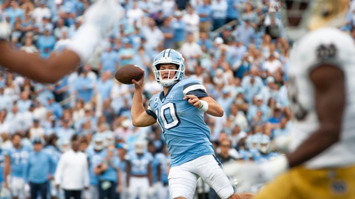 UNC freshman quarterback, Drake Maye throws a pass in Kenan Stadium on Sept. 24, 2022, during the UNC game against Notre Dame. UNC lost 45-32.