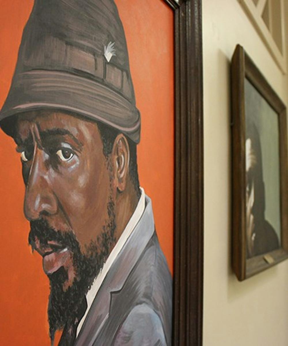Paintings from Pepper's Pizza hanging in Hill Hall recently purchased by Chairman of the Music Department Mark Katz. 
