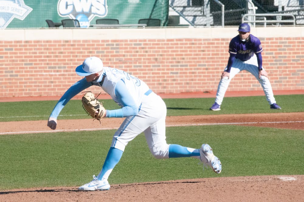 <p>UNC first-year pitcher Max Carlson (35) delivers a pitch during UNC's 7-4 win over James Madison at Boshamer Stadium, Feb. 20, 2021.</p>