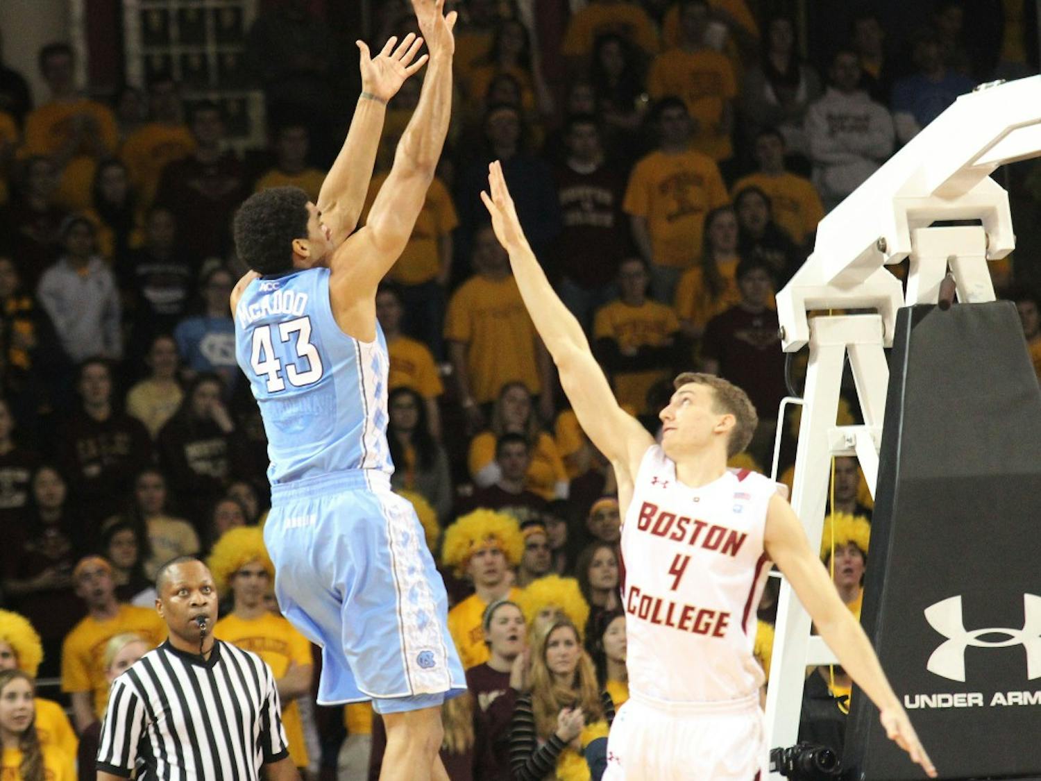 	James Michael McAdoo goes up for a contested shot against Boston College&#8217;s Eddie Odio.