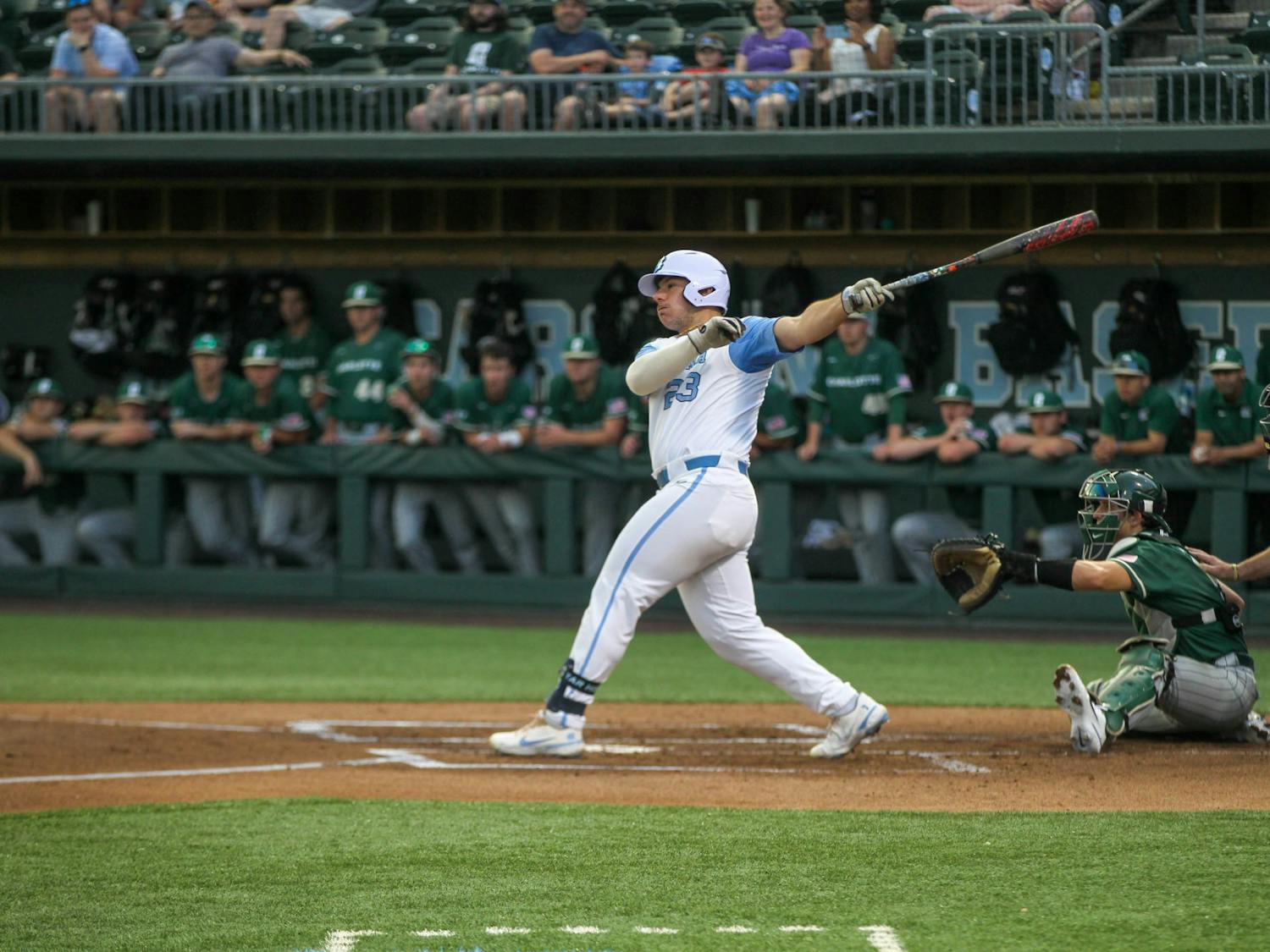UNC sophomore first basemen and designated hitter Alberto Osuna (23) hits the ball during the baseball game against Charlotte on Tues. May 3, 2022 at Boshamer Stadium. UNC beat Charlotte 4-3.