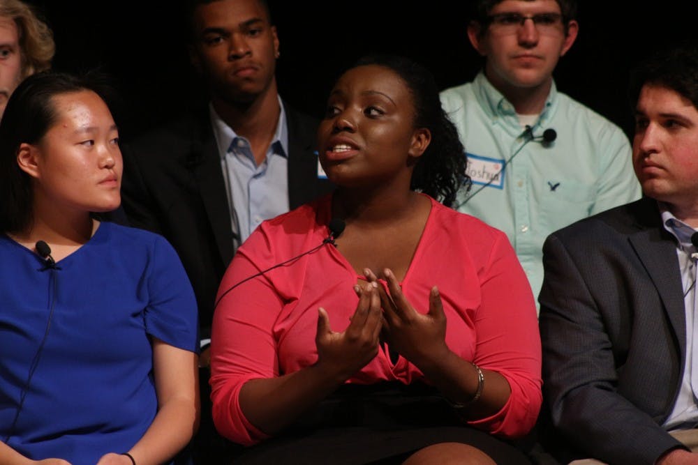 Raleigh Charter High School Senior Kari Degraffenreid voices her opinion on gun violence at the Reverse Town Hall in the Stone Center on April 22.