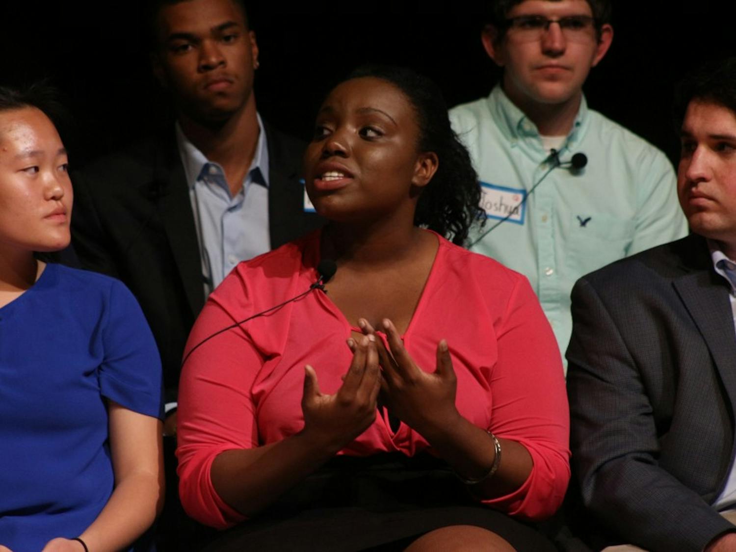 Raleigh Charter High School Senior Kari Degraffenreid voices her opinion on gun violence at the Reverse Town Hall in the Stone Center on April 22.
