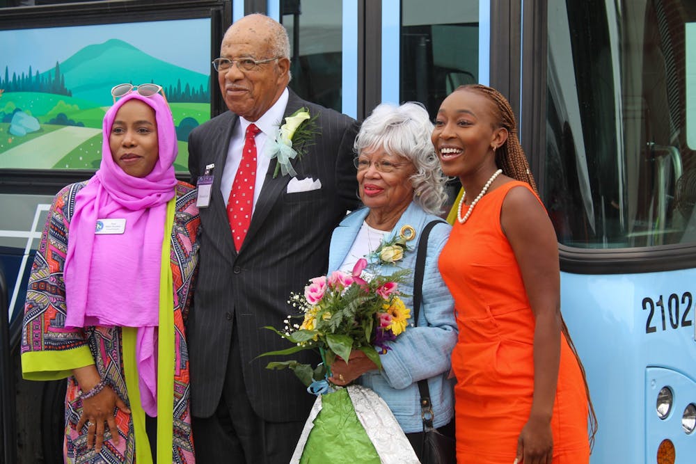 <p>The Town of Chapel Hill renamed the Chapel Hill Transit Facility after former Chapel Hill Mayor and state Senator Howard Lee and his wife Lillian Lee at a ceremony on Monday, June 21, 2022. Paris Miller-Foushee, Howard Lee, Lillian Lee and Teddy Vann gather after the ceremony.&nbsp;</p>
