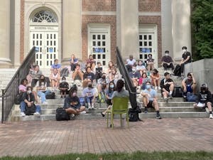 A class meets outside of Manning Hall on Sept. 23, 2021, during a power outage that affected a large portion of North Campus. 